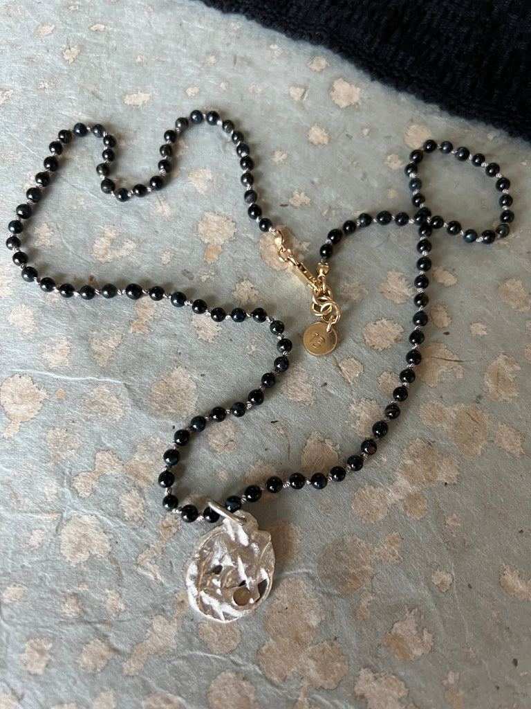 One-of-a-kind silver pendant hand knotted necklace