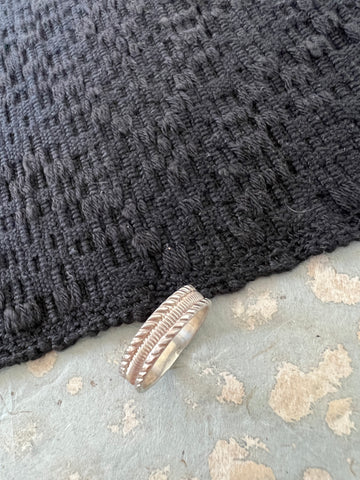 Patterned silver band ring