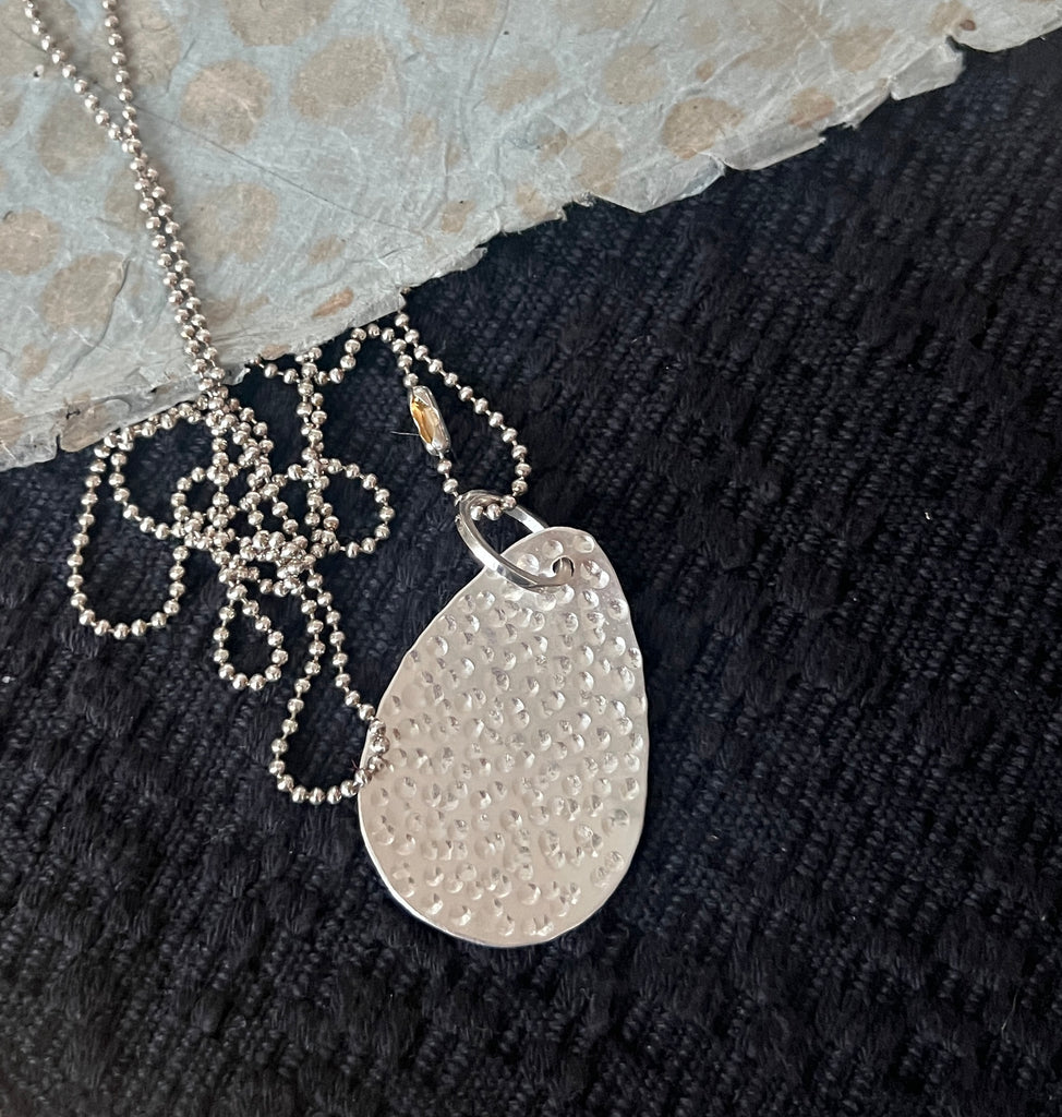 Textured silver pendant necklace